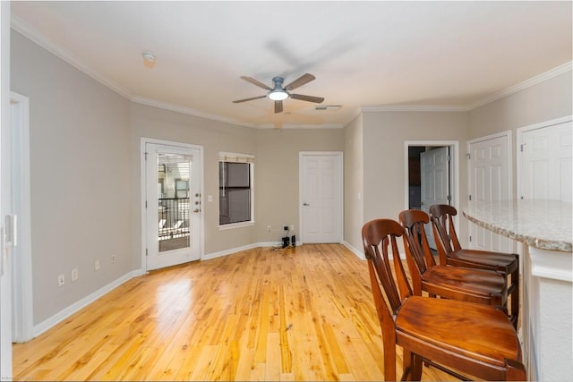 2502 Leon St Unit 305, Austin, TX 78705 - sitting room featuring ornamental molding, a ceiling fan, and light wood-style flooring