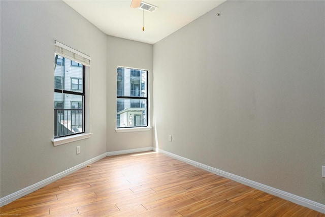 2502 Leon St Unit 305, Austin, TX 78705 - empty room with light wood finished floors and baseboards