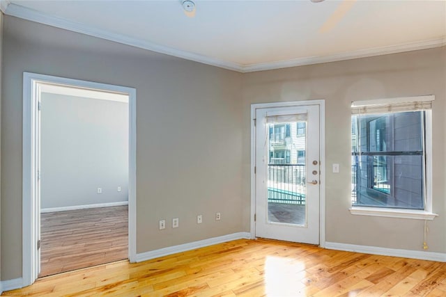 2502 Leon St Unit 305, Austin, TX 78705 - entryway featuring crown molding and light wood-type flooring