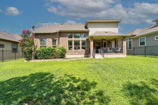 174 Jayne Cv, Austin, TX 78737 - back of property featuring ceiling fan, a fenced backyard, and brick siding