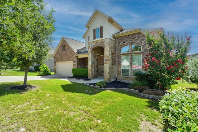 174 Jayne Cv, Austin, TX 78737 - view of front of house with driveway, stone siding, a garage, and a front yard