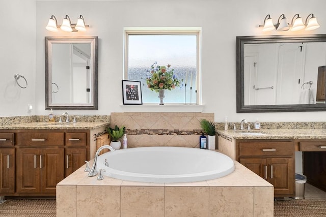 174 Jayne Cv, Austin, TX 78737 - bathroom with two vanities and a bath