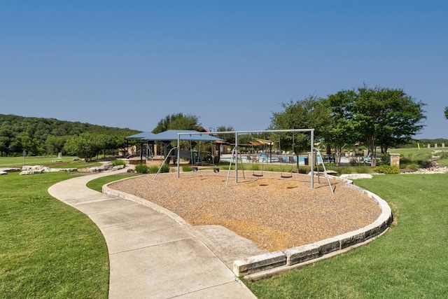 174 Jayne Cv, Austin, TX 78737 - view of community featuring a lawn