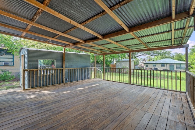 932 E 53 1/2 St, Austin, TX 78751 - wooden deck with a shed and a lawn