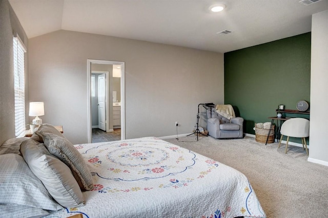 508 Bluffview Dr, Bastrop, TX 78602 - carpeted bedroom with baseboards and lofted ceiling