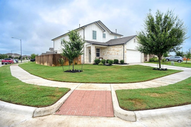 508 Bluffview Dr, Bastrop, TX 78602 - view of front of house with stone siding, board and batten siding, an attached garage, and driveway