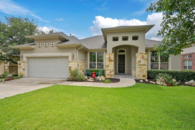 204 Lake Como Dr, Austin, TX 78734 - prairie-style home featuring stucco siding, stone siding, a front yard, and a shingled roof