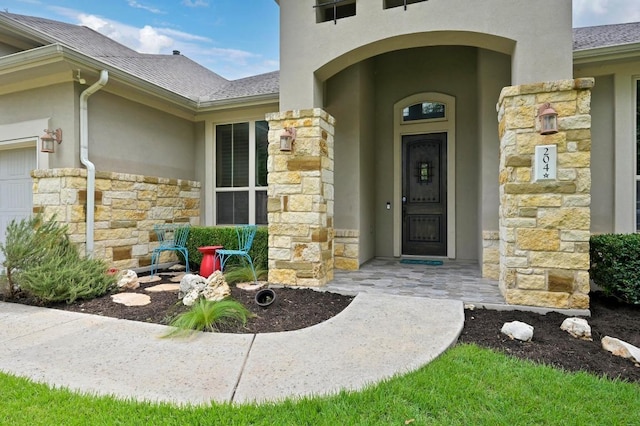 204 Lake Como Dr, Austin, TX 78734 - doorway to property with stone siding, stucco siding, and roof with shingles