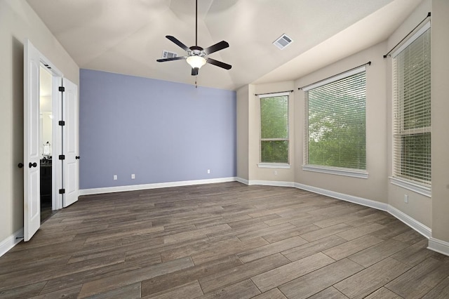 204 Lake Como Dr, Austin, TX 78734 - empty room featuring lofted ceiling, a ceiling fan, and dark wood-type flooring
