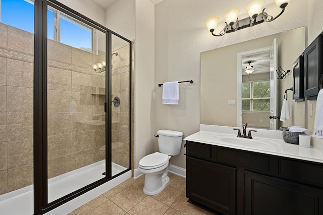 204 Lake Como Dr, Austin, TX 78734 - full bath with a stall shower, vanity, tile patterned floors, and ceiling fan