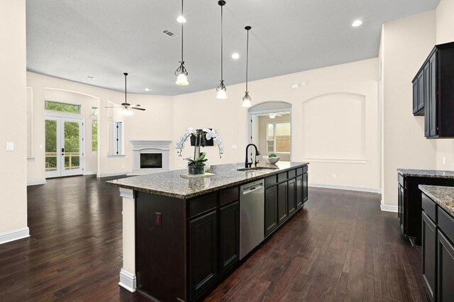 204 Lake Como Dr, Austin, TX 78734 - kitchen with stainless steel dishwasher, a ceiling fan, dark wood-style floors, healthy amount of natural light, and recessed lighting
