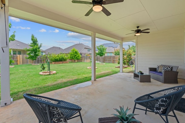 4409 Arques Ave, Round Rock, TX 78681 - fenced backyard featuring ceiling fan, a patio, and a residential view