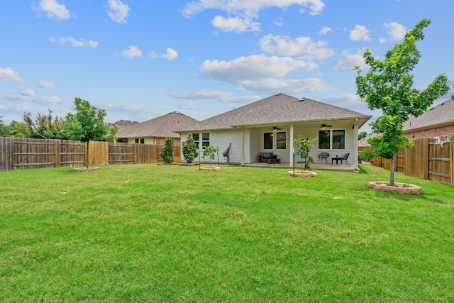 4409 Arques Ave, Round Rock, TX 78681 - back of property with a ceiling fan, a fenced backyard, a patio, and roof with shingles
