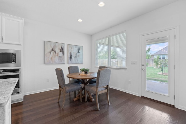 4409 Arques Ave, Round Rock, TX 78681 - dining room featuring dark wood finished floors and recessed lighting