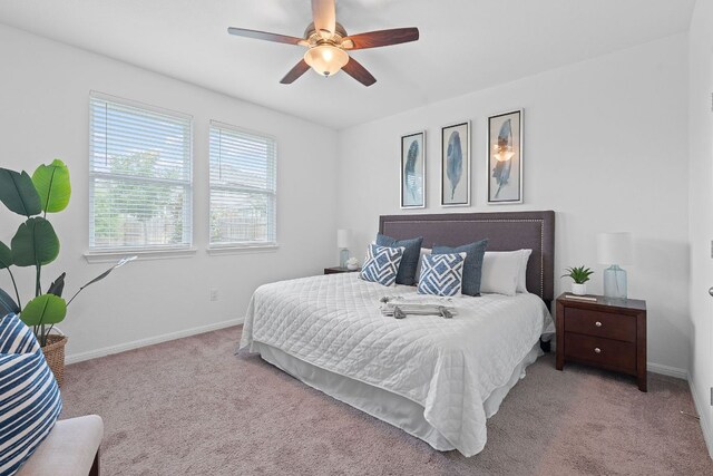 4409 Arques Ave, Round Rock, TX 78681 - carpeted bedroom featuring baseboards and ceiling fan