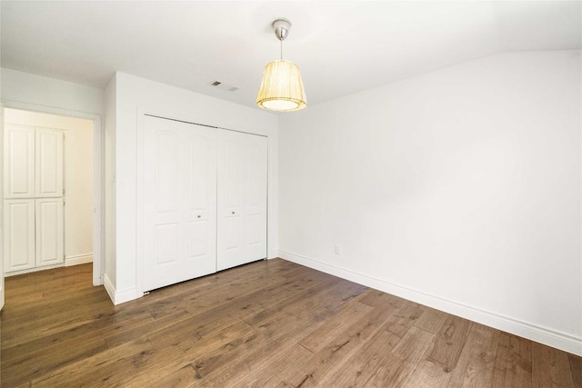10703 Keystone Bnd, Austin, TX 78750 - unfurnished bedroom featuring wood finished floors and a closet