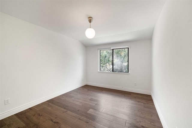 10703 Keystone Bnd, Austin, TX 78750 - spare room with dark wood-type flooring and baseboards