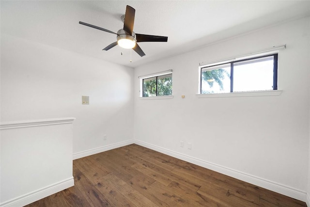 10703 Keystone Bnd, Austin, TX 78750 - spare room with dark wood-style floors and ceiling fan