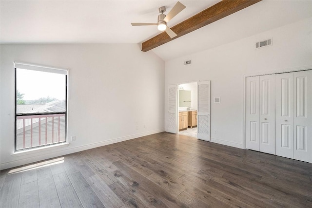 10703 Keystone Bnd, Austin, TX 78750 - unfurnished bedroom with dark wood-style floors, a closet, a ceiling fan, and ensuite bathroom
