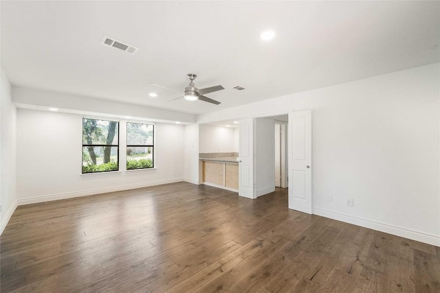 10703 Keystone Bnd, Austin, TX 78750 - empty room with a ceiling fan, recessed lighting, and dark wood-style floors