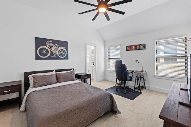 carpeted bedroom featuring lofted ceiling, a ceiling fan, and connected bathroom