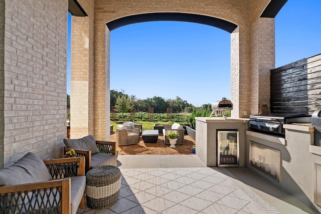 view of patio with exterior kitchen