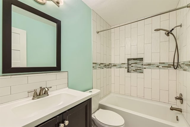 1121 Stoneoak Ln, Austin, TX 78745 - bathroom featuring vanity, tub / shower combination, and backsplash