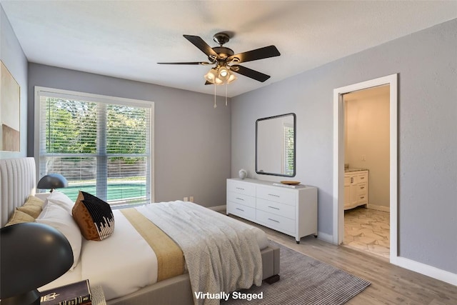 1121 Stoneoak Ln, Austin, TX 78745 - bedroom featuring light wood-type flooring and ceiling fan