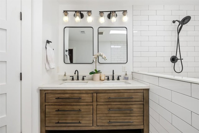 6317 Gato Path, Austin, TX 78731 - bathroom featuring double vanity and tiled shower