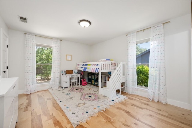 6317 Gato Path, Austin, TX 78731 - bedroom with wood finished floors