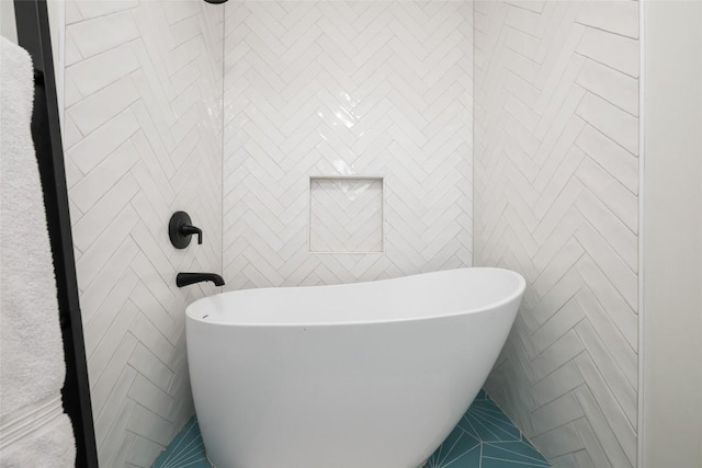 6317 Gato Path, Austin, TX 78731 - full bath with a freestanding bath and tile walls