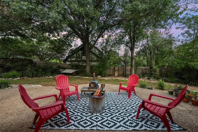 6317 Gato Path, Austin, TX 78731 - fenced backyard with a patio area and an outdoor fire pit