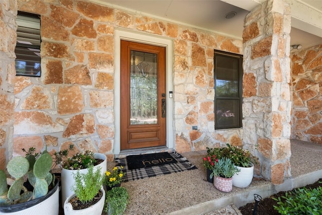 6317 Gato Path, Austin, TX 78731 - view of exterior entry featuring stone siding