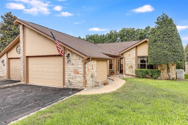 45 Oaks Pl, Lago Vista, TX 78645 - mid-century home with stone siding, an attached garage, a front lawn, stucco siding, and driveway