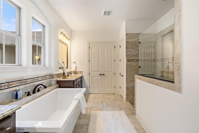 6000 Osceola Trl, Austin, TX 78738 - bathroom with walk in shower, vanity, and a bath