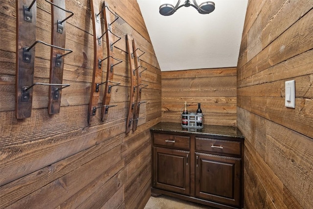 6000 Osceola Trl, Austin, TX 78738 - wine area with lofted ceiling, wood walls, and a chandelier