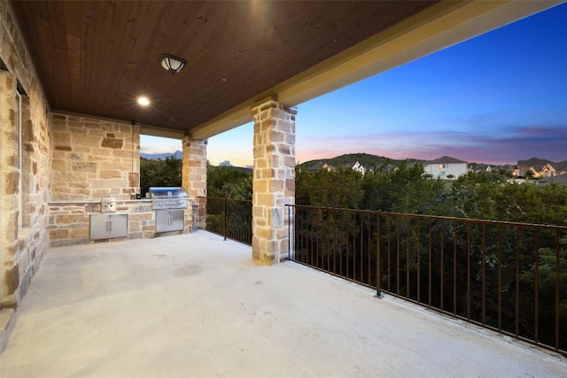 6000 Osceola Trl, Austin, TX 78738 - view of patio / terrace featuring an outdoor kitchen