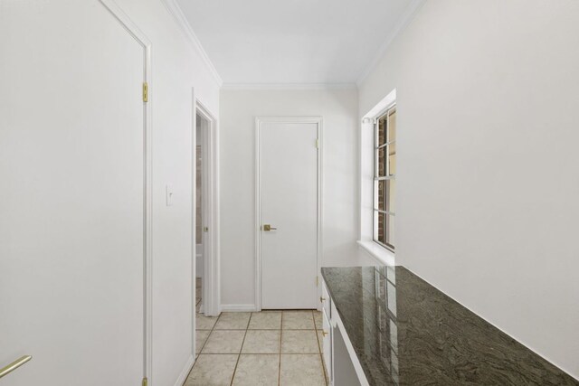 4217 Greystone Dr N, Austin, TX 78731 - corridor featuring crown molding and light tile patterned floors