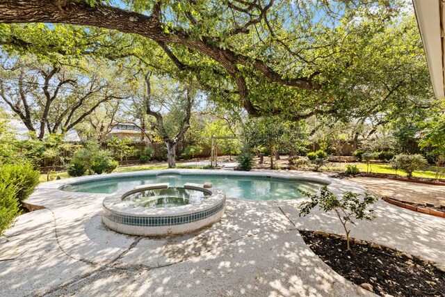4217 Greystone Dr N, Austin, TX 78731 - view of pool featuring a pool with connected hot tub and a patio area