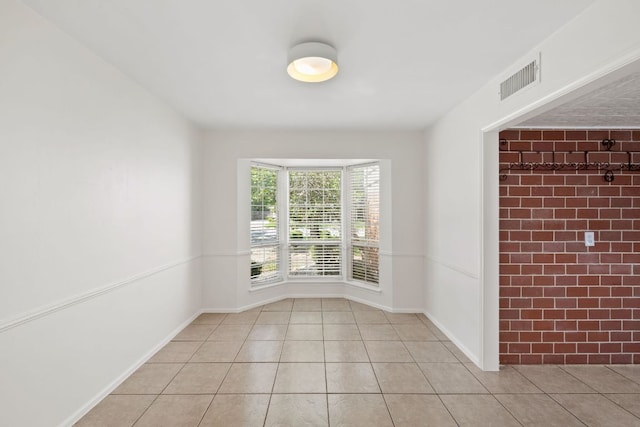 4217 Greystone Dr N, Austin, TX 78731 - unfurnished room featuring tile patterned flooring and baseboards