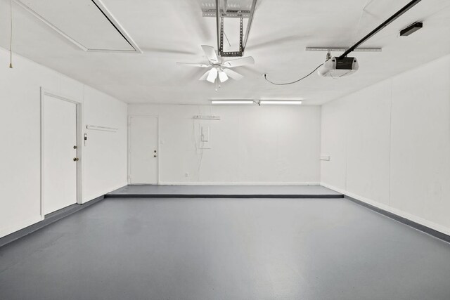 4217 Greystone Dr N, Austin, TX 78731 - garage with a garage door opener and ceiling fan