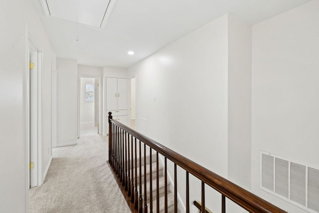 4217 Greystone Dr N, Austin, TX 78731 - hallway featuring attic access, carpet, recessed lighting, and an upstairs landing