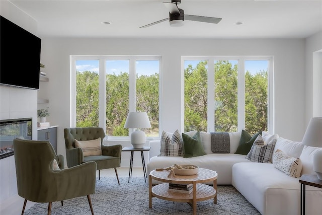7809 Old Bee Caves Rd Unit 12, Austin, TX 78735 - living room featuring a ceiling fan, a tiled fireplace, and recessed lighting
