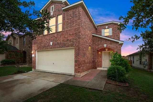 11104 Helms Deep Dr, Austin, TX 78754 - traditional home with brick siding, a garage, and driveway
