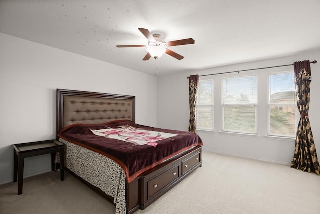 11104 Helms Deep Dr, Austin, TX 78754 - bedroom with light colored carpet and ceiling fan