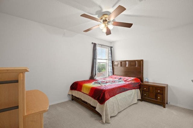 11104 Helms Deep Dr, Austin, TX 78754 - carpeted bedroom with baseboards and ceiling fan