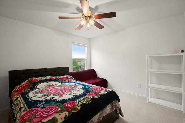 11104 Helms Deep Dr, Austin, TX 78754 - carpeted bedroom with baseboards and ceiling fan