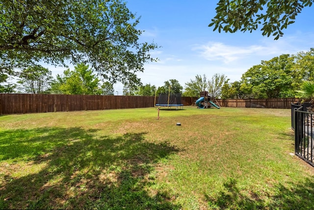 11606 Uplands Ridge Dr, Bee Cave, TX 78738 - fenced backyard featuring a playground and a trampoline