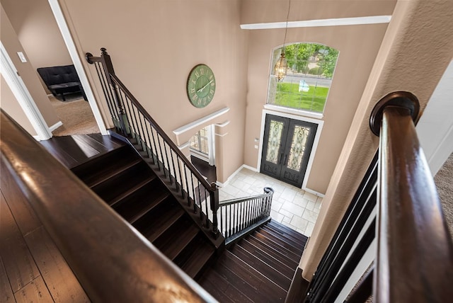 11606 Uplands Ridge Dr, Bee Cave, TX 78738 - foyer entrance with a towering ceiling, french doors, and stairs