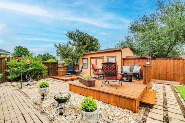18717 Shoreless Dr, Pflugerville, TX 78660 - deck with a fenced backyard and an outdoor structure
